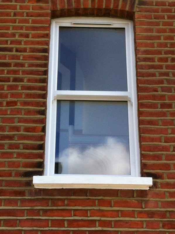 uPVC sash window on Victorian red brick house in Tulse Hill